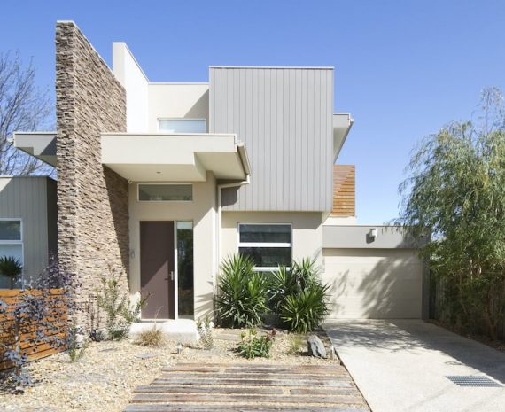 Facade of a contemporary double storey townhouse home Front of a two storey contemporary architect designed townhouse home